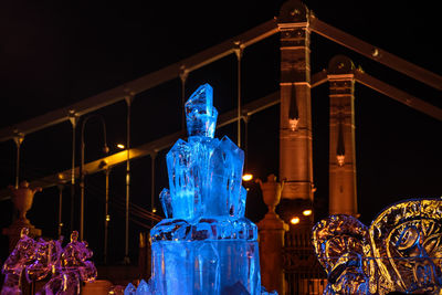 Low angle view of ice blue  crystal at night