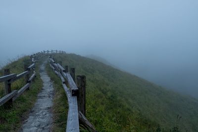 Scenic view of mountains in foggy weather