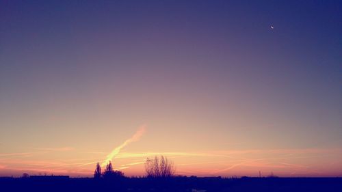 Smoke emitting from chimney against sky