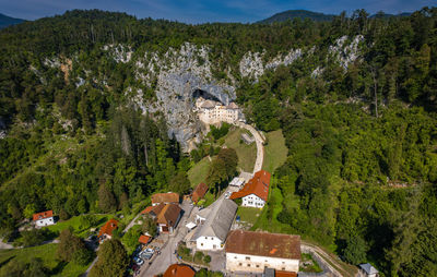 High angle view of townscape against mountain