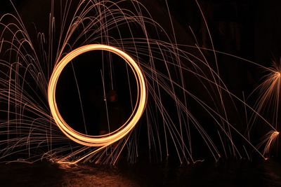 Blurred motion of wire wool spinning at night