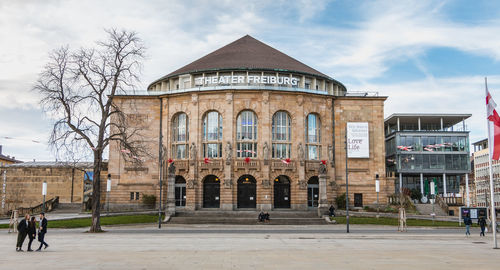 Facade of historic building against sky