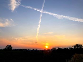 Scenic view of silhouette landscape against sky during sunset