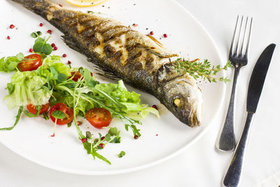 Close-up of fish served in plate