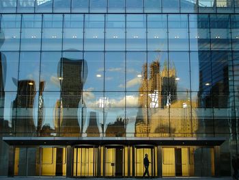 Reflection on modern glass building