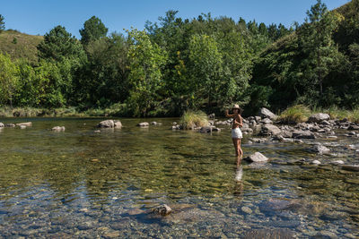 Scenic view of lake against trees