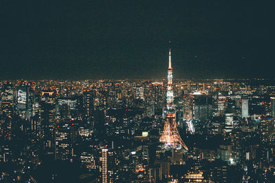 Illuminated buildings in city at night