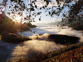 Scenic view of mountains against sky during sunset