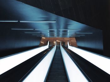 Low angle view of escalator at subway