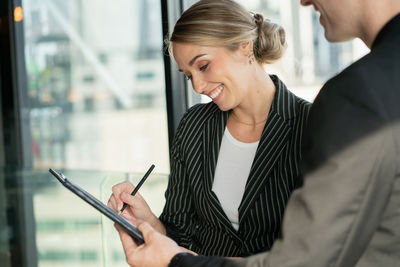 Young woman using mobile phone