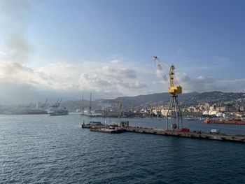 Panoramic view harbor genoa blue sky sea white clouds buildings in harmony mediterranean landscape