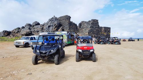 Cars on road against sky