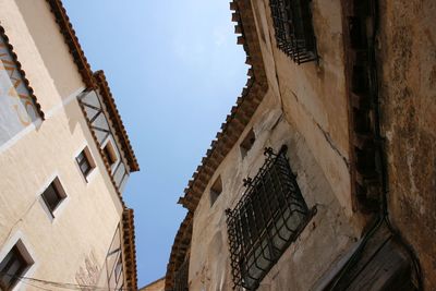 Low angle view of buildings against clear sky