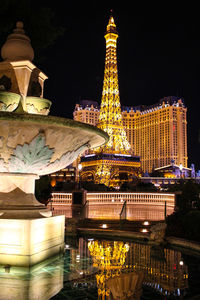 Low angle view of illuminated eiffel tower at night