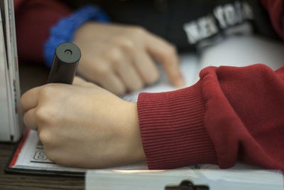 Close-up of man using mobile phone