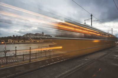 Train on railroad tracks against sky