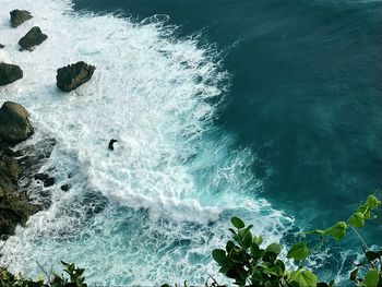 High angle view of waves in sea