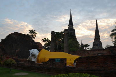 View of temple against building