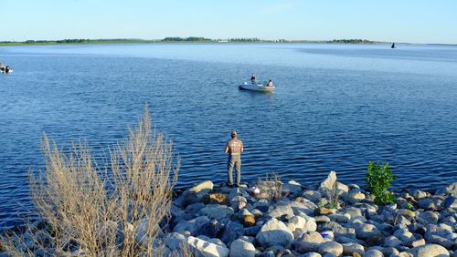 Scenic view of lake against clear sky