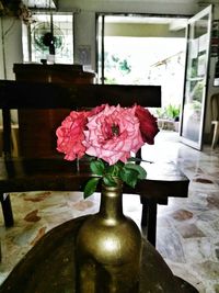 Close-up of flower vase on table