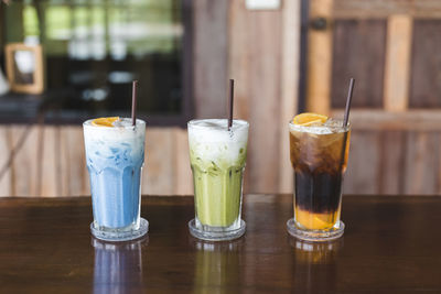 Close-up of various drink on table