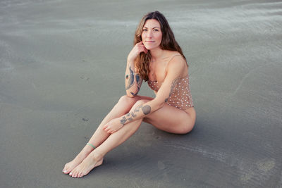 Beautiful woman on the beach in tofino