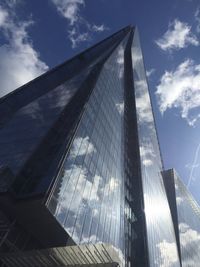 Low angle view of skyscrapers against sky