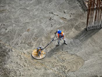 High angle view of people skiing on land