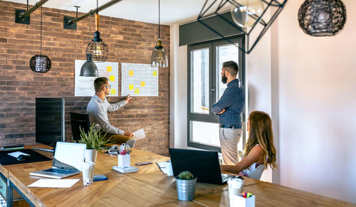 Business people discussing in meeting at office