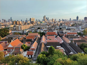 High angle view of buildings in city against sky