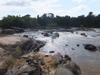 Scenic view of river against sky