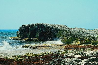 Scenic view of sea against clear sky