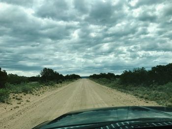 Road seen through car windshield