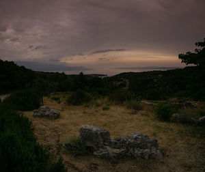 Scenic view of landscape against sky during sunset