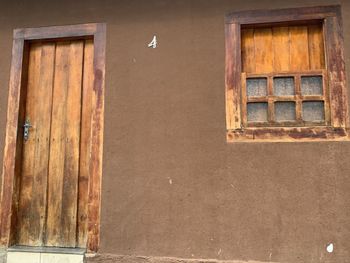 Low angle view of window on old building