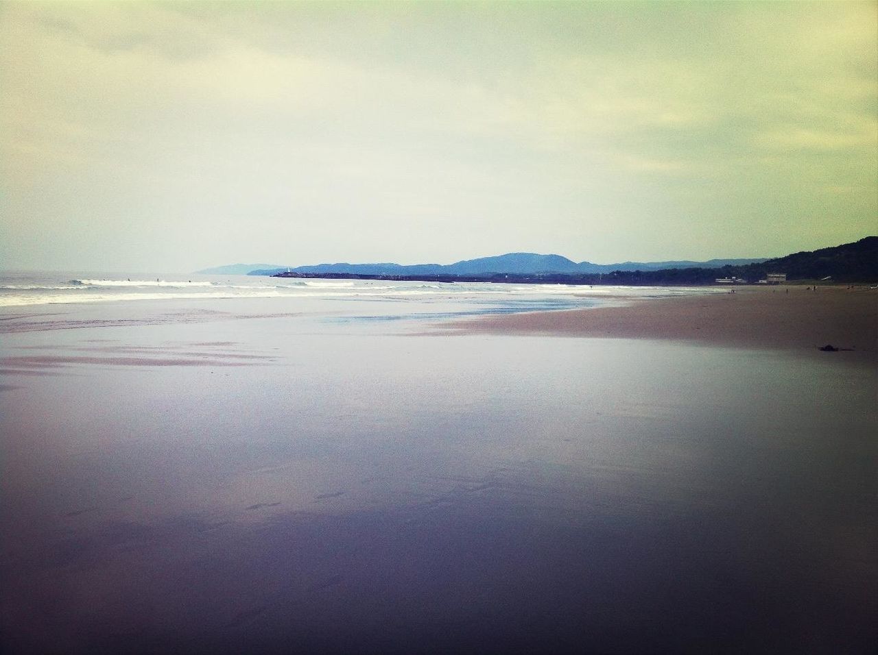 sea, beach, water, tranquil scene, scenics, tranquility, horizon over water, sky, beauty in nature, shore, sand, nature, idyllic, cloud - sky, coastline, wave, remote, calm, outdoors, non-urban scene