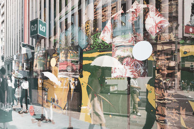 People at street market in city