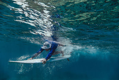 Man surfing in sea