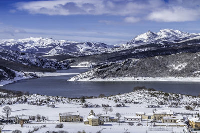 Scenic view of snow covered mountain against sky