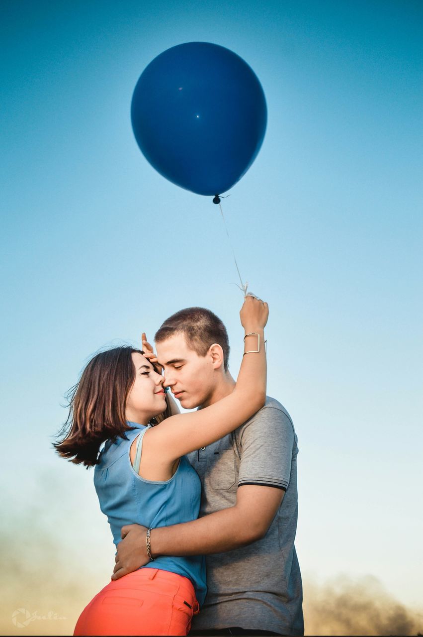 leisure activity, lifestyles, childhood, person, boys, elementary age, togetherness, girls, bonding, blue, love, fun, clear sky, casual clothing, enjoyment, innocence, happiness