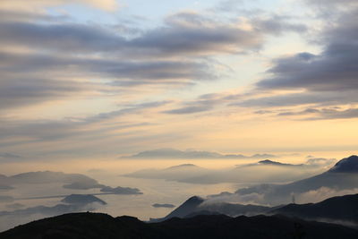 Scenic view of mountains against sky during sunset