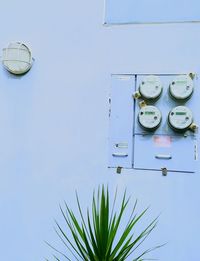 Shot of electric meters in a blue background 