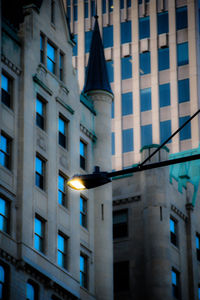 Low angle view of illuminated building at night