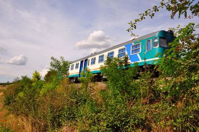 Low angle view of train against sky