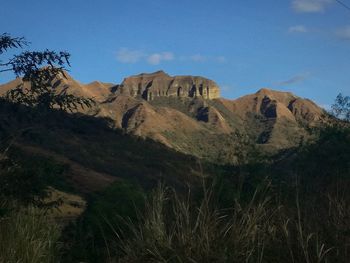 Low angle view of mountains against clear sky