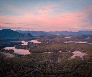 Scenic view of field against sky during sunset, tofino beach vancouver island from above