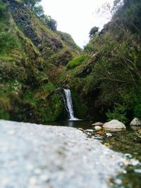 Surface level of water flowing through rocks