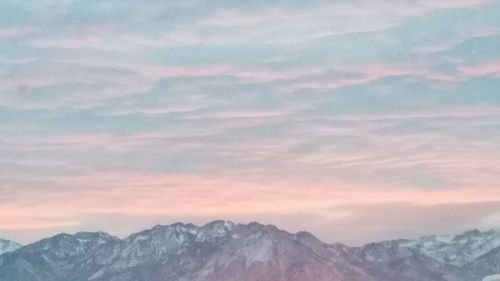 Scenic view of mountains against dramatic sky