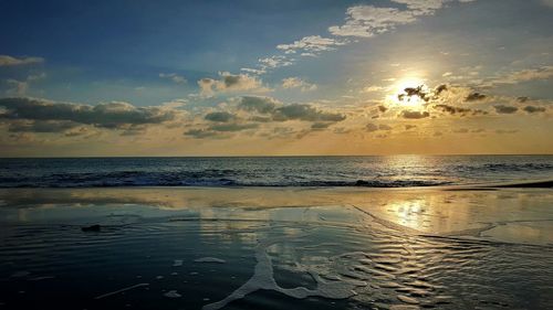 Scenic view of sea against sky during sunset