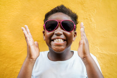 Portrait of smiling boy wearing sunglasses